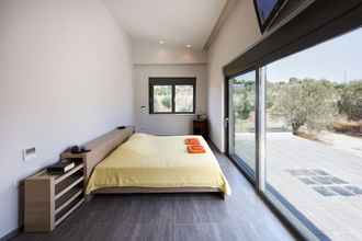 Bedroom 4 Tramonto Di Olive Gorgeous Villa by VillaRentalsgr