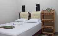 Kamar Tidur 3 Jingga Guesthouse