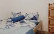 Kamar Tidur 5 Jingga Guesthouse