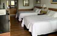 Bedroom 6 Hallmarc Inn & Suites of West Memphis