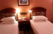 Bilik Tidur 4 Hotel Suryansh