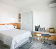 Phòng ngủ 2 Pharos Apartments