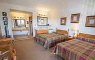 Bedroom 6 Bullwinkles Rustic Lodge