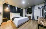 Bedroom 6 Luxury Motel