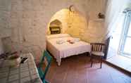 Bedroom 2 Trullo del Falegname Ostuni by Typney