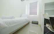 Bedroom 2 Tranquil 2BR @ Green Pramuka Apartment