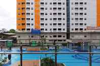 Swimming Pool Modern and Bright 2BR Green Pramuka Apartment