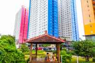 Exterior Homey 1BR with Spacious Living Room and Sofa Bed Green Pramuka Apartment