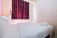 Kamar Tidur Homey 1BR with Spacious Living Room and Sofa Bed Green Pramuka Apartment