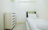 Bedroom 7 Minimalist 2BR at Green Pramuka Apartment