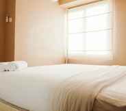 Bedroom 5 Contemporary 2BR at Bassura City Apartment