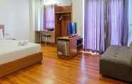 Bedroom 2 Azalea Suites Cikarang Studio Apartment with Bathtub