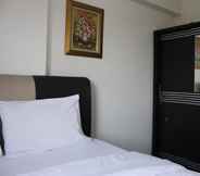 Bedroom 7 Minimalist 2BR Apartment at Gateway Ahmad Yani