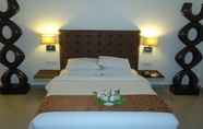 ห้องนอน 5 Srm Hotels