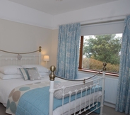 Bedroom 4 Halwell Lodge