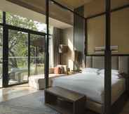 Kamar Tidur 5 The Mulian Urban Resort Hotels Huadu