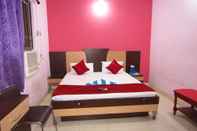 ห้องนอน Goroomgo Puri Dham Lodge Puri
