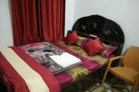 Kamar Tidur Hotel Dev Dham