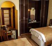 Kamar Tidur 4 Grand Hotel Duman