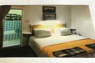 Kamar Tidur White House B&B