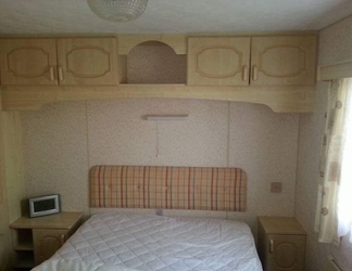 Bedroom 2 T & J's Caravan - Golden Palm