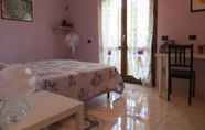 Bilik Tidur 3 B&B Maison Fleurie