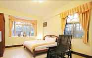 Bilik Tidur 7 Flora Rexort Guesthouse