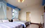 Bilik Tidur 3 Flora Rexort Guesthouse