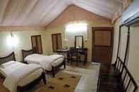 Phòng ngủ Camp Dev Vilas Kanha