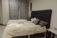 Kamar Tidur Hotel Garden Plaza