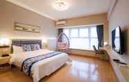 Phòng ngủ 5 Yue Tu Apartment Hotel