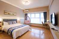 Phòng ngủ Yue Tu Apartment Hotel