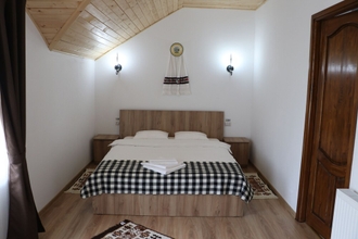 Bedroom 4 Pensiunea Maramures Landscape