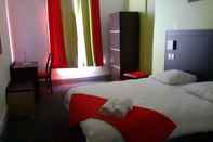 Bedroom Enzo Hotels Contrexeville by Kyriad Direct