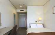 Kamar Tidur 2 Chino Sky View Hotel