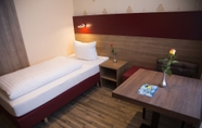 Kamar Tidur 2 Alexander Business Hotel