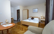 Bedroom 6 Apartments Botica