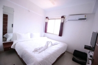 ห้องนอน Latanand Residency