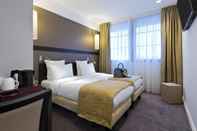 Kamar Tidur Simon's Boutique Hotel