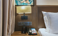 Bedroom 6 Zmax Hotel