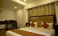 Kamar Tidur 7 The Continentti Whitefield