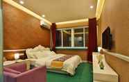 Kamar Tidur 4 Liyuan Business Hotel