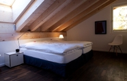 Bedroom 6 Chalet Altesse Serviced Apartments