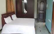 Bedroom 2 Maxiprime Hotels Panaiyur