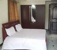 Phòng ngủ 2 Maxiprime Hotels Panaiyur