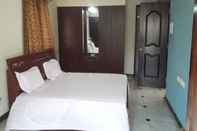 Bedroom Maxiprime Hotels Panaiyur