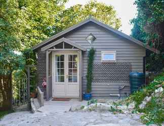 Exterior 2 Rustic Cabin Getaway in Brighton