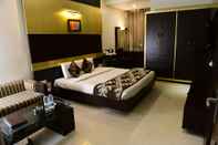 Bedroom Hotel Ravisha Continental