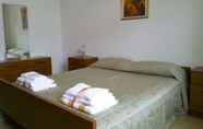 ห้องนอน 5 Casa Enea Sperlongaresort