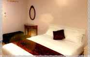 Bedroom 2 Ya Tai Hotel